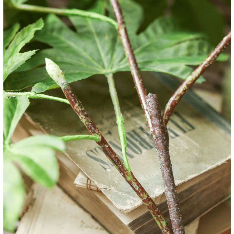 Artificial octagonal foliage branch 37.4 inches tall with green leaves on a box on Tampa Home & Garden Store