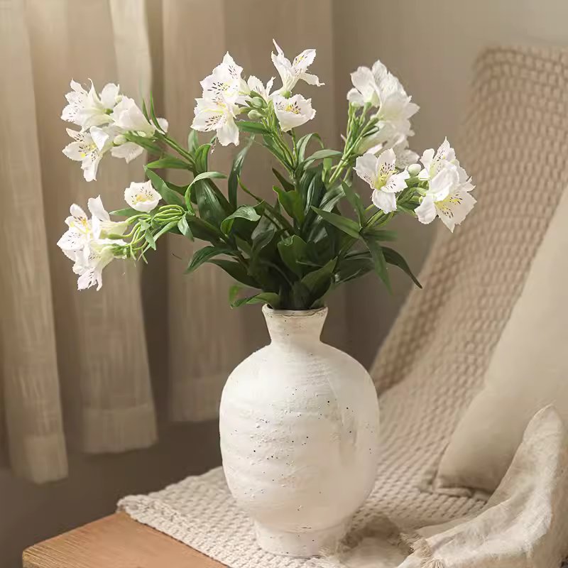 Artificial Peruvian Lily stem with white blooms in a white speckled ceramic vase RusticReach on Tampa Home & Garden Store
