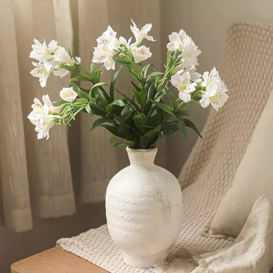 Artificial Peruvian Lily stem with white blooms in a white speckled ceramic vase RusticReach on Tampa Home & Garden Store