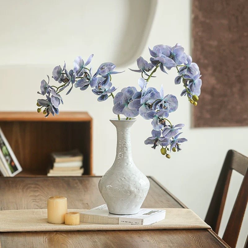 Real Touch Orchid Stem by RusticReach, lavender, 35in tall, in white vase on wood table on Tampa Home & Garden Store