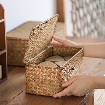Natural straw storage basket with lid by RusticReach; open lid reveals round discs inside on Tampa Home & Garden Store