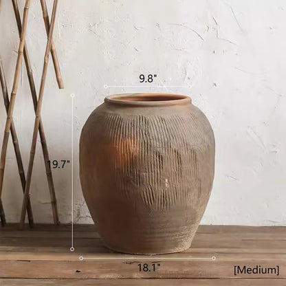 Round brown earthenware planter by RusticReach with ribbed texture, medium size on Tampa Home & Garden Store