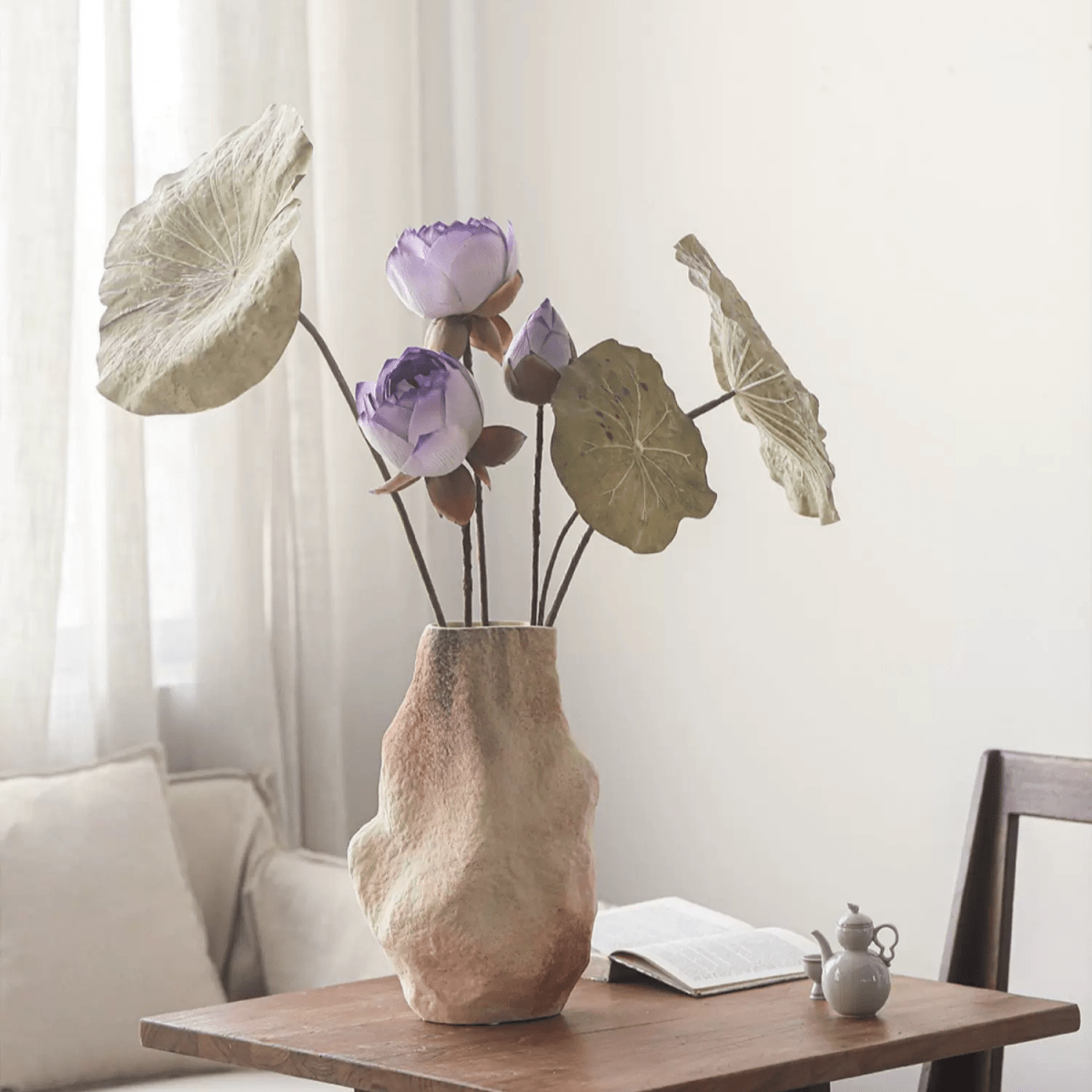 Artificial Rustic Lotus Stem with purple blooms and beige leaves in a textured vase on Tampa Home & Garden Store