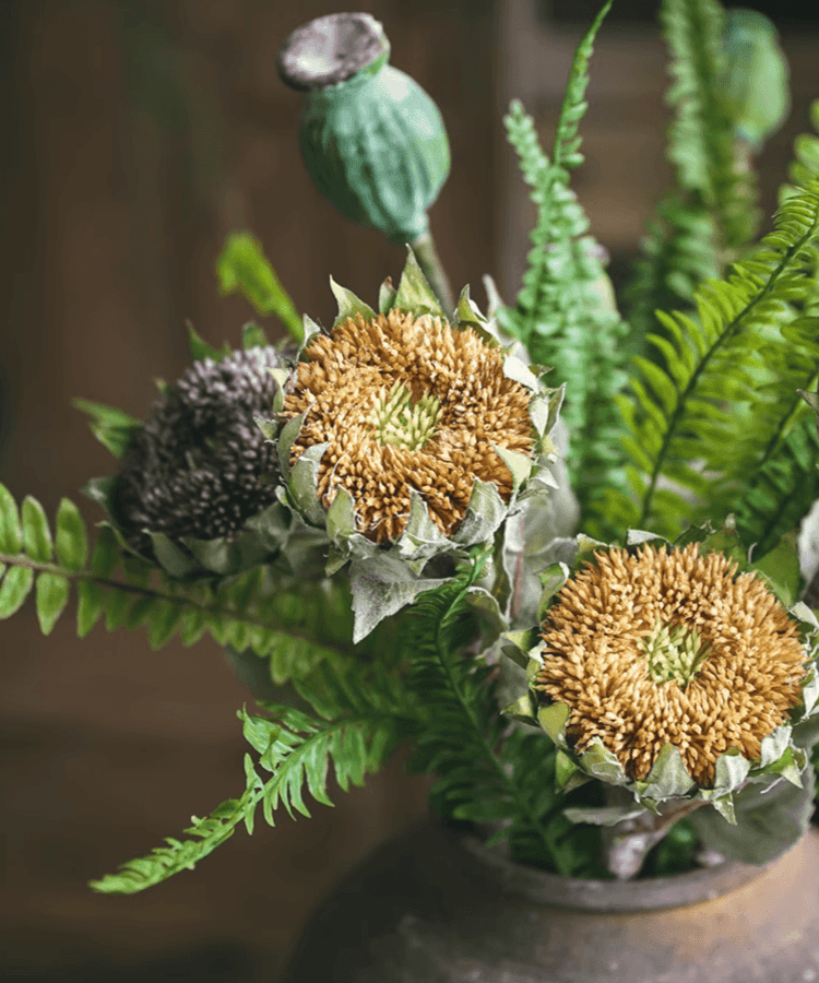Artificial small head sunflower stem with two blooms, brown centers and green fern foliage on Tampa Home & Garden Store
