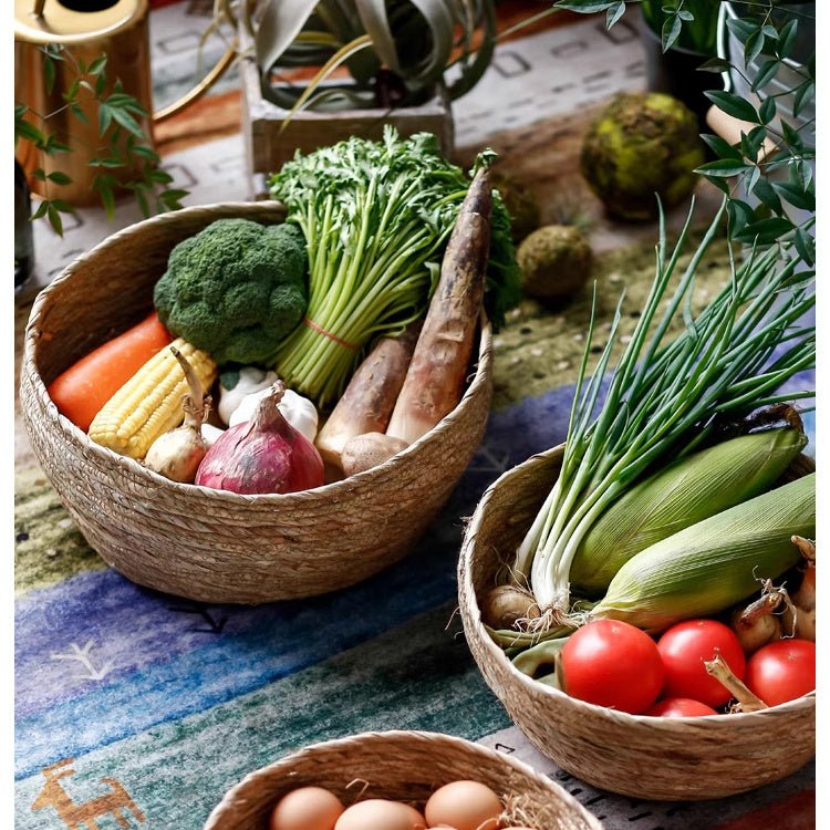 Three seagrass bowl baskets for storage or display with fresh vegetables on Tampa Home & Garden Store