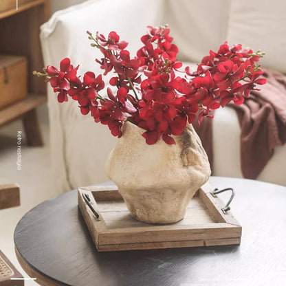 Single Red Orchid Stem by RusticReach, 24in tall in a textured beige vase on a wooden tray on Tampa Home & Garden Store