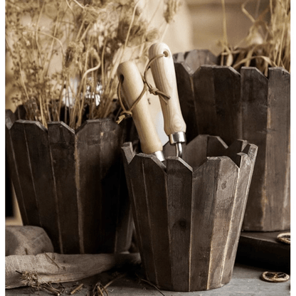 Spliced solid wood planter round with dark stain and vertical slatted sides (set of two) on Tampa Home & Garden Store