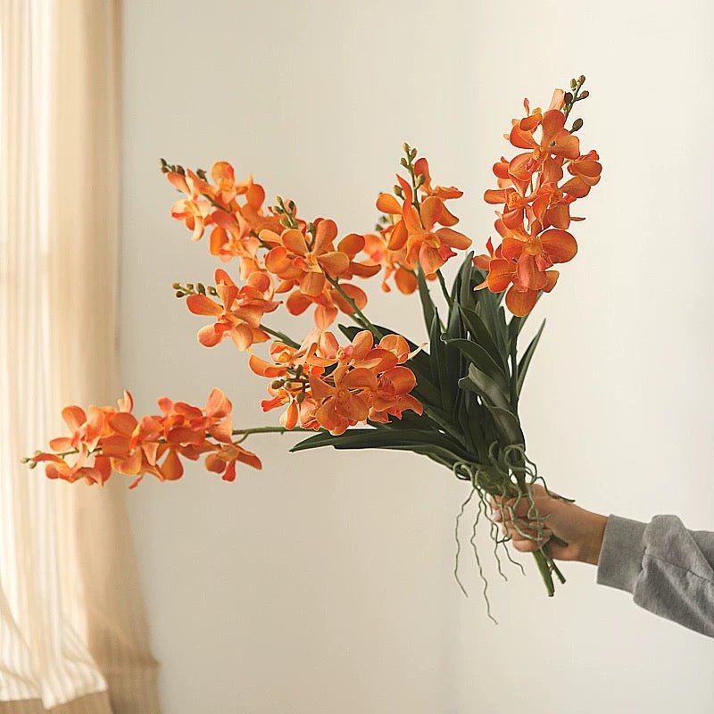 Faux Vanda Orchid Stem 24-inch tall with orange blossoms and green leaves by RusticReach on Tampa Home & Garden Store