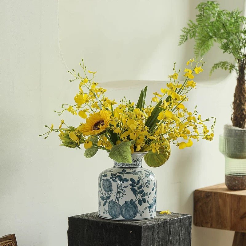 Wendy's Dancing Lady Orchid Stem by RusticReach yellow blooms in blue porcelain vase on Tampa Home & Garden Store