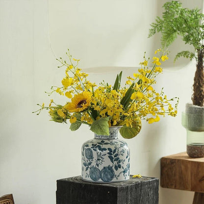 Wendy's Dancing Lady Orchid Stem by RusticReach yellow blooms in blue porcelain vase on Tampa Home & Garden Store