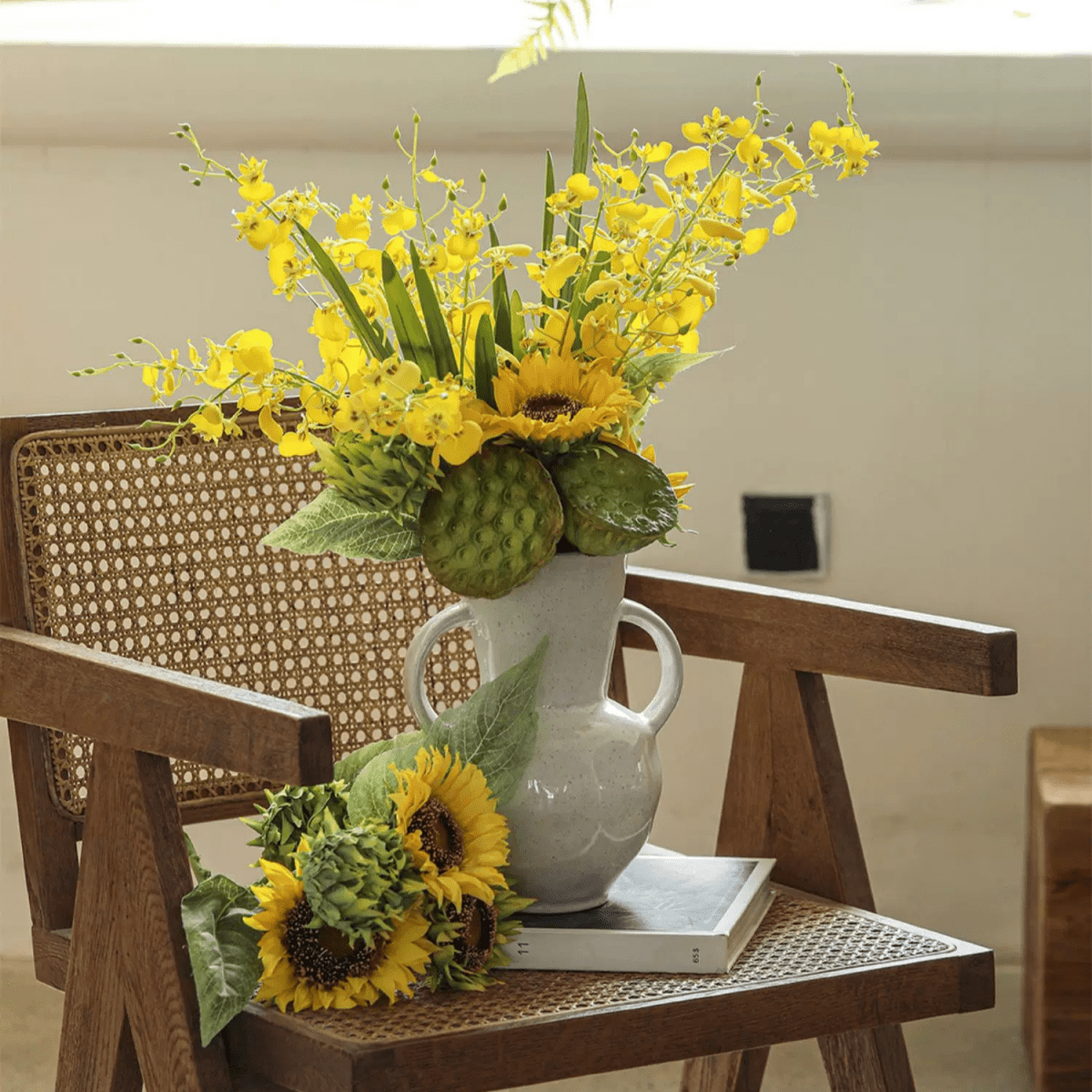 Wendy's Dancing Lady Orchid Stem 20.5in arrangement in white ceramic pitcher with yellow sunflowers on Tampa Home & Garden Store