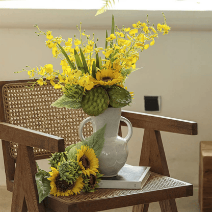 Wendy's Dancing Lady Orchid Stem 20.5in arrangement in white ceramic pitcher with yellow sunflowers on Tampa Home & Garden Store
