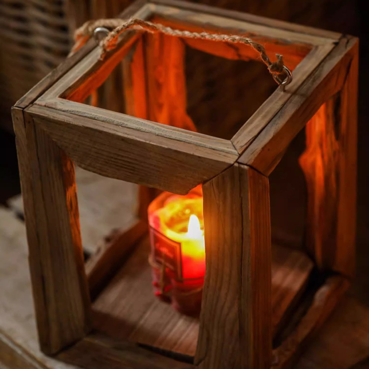 Farmhouse lantern with rope handle; warm candle glow inside; hanging or tabletop on Tampa Home & Garden Store