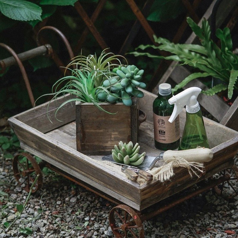 Small wooden wagon flower cart with succulents and rustic finish on Tampa Home & Garden Store