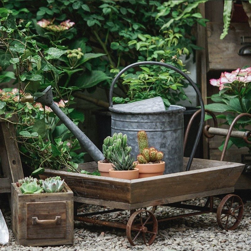 Small wooden wagon flower cart by RusticReach with metal wheels and terracotta succulent pots on Tampa Home & Garden Store