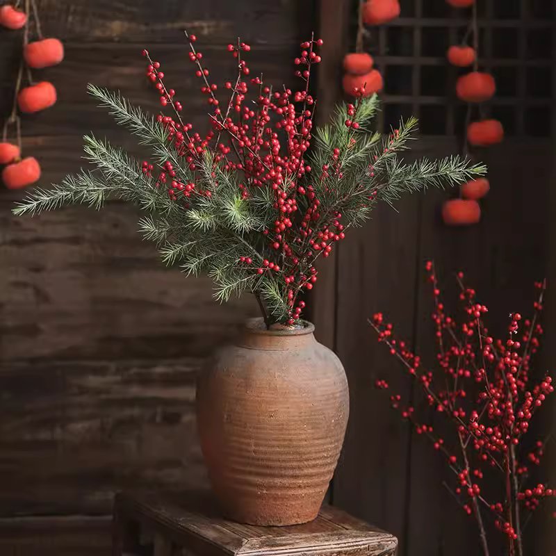 Faux Red Winterberry Stem arrangement with pine sprigs in a rustic ceramic vase RusticReach on Tampa Home & Garden Store