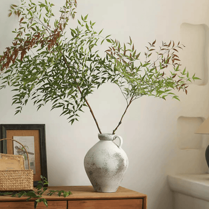 Watertight One Handle Pottery Vase, gray speckled ceramic with a single handle holding greenery on Tampa Home & Garden Store
