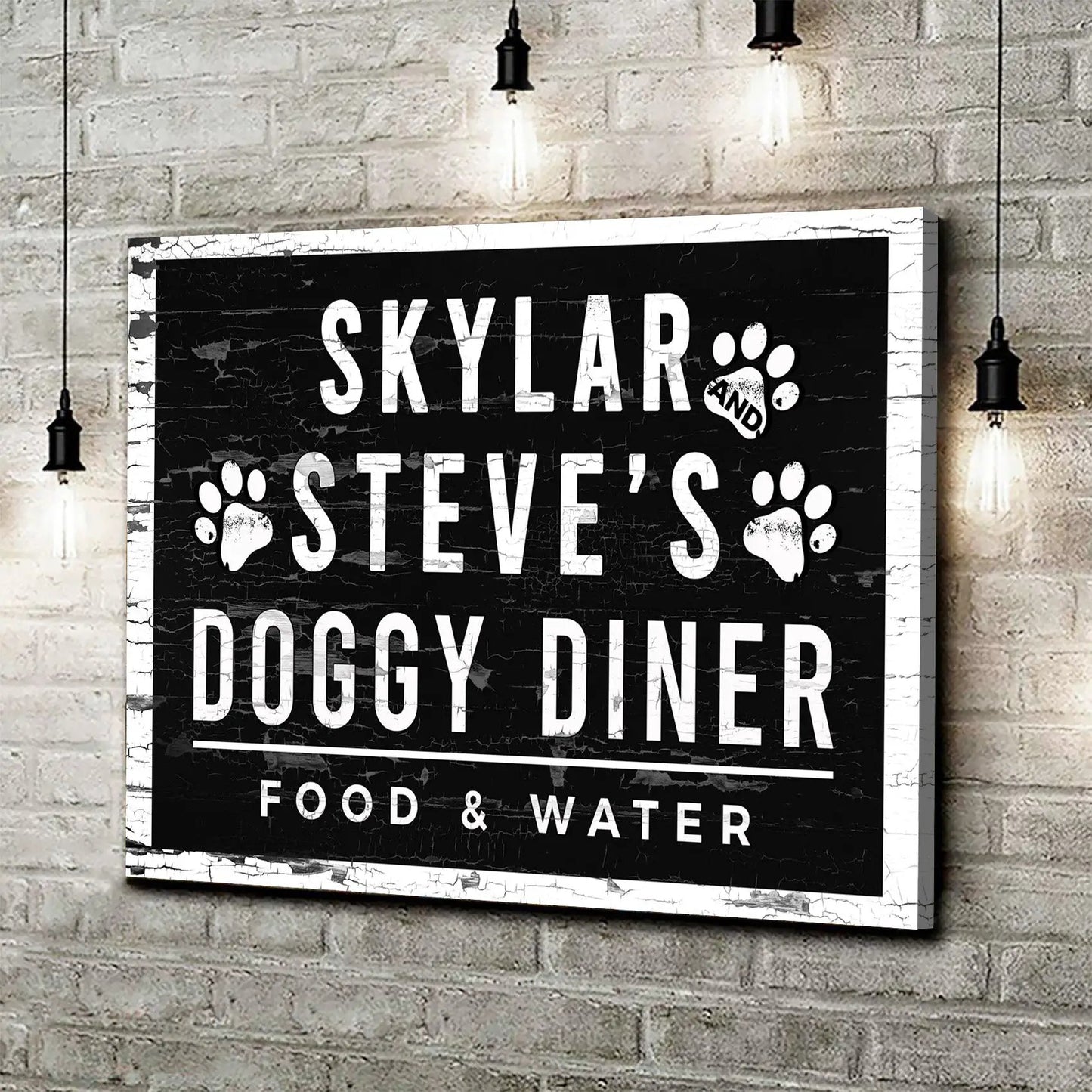 Canvas Doggy Diner sign with bold white lettering and paw prints on a distressed black panel on Tampa Home & Garden Store