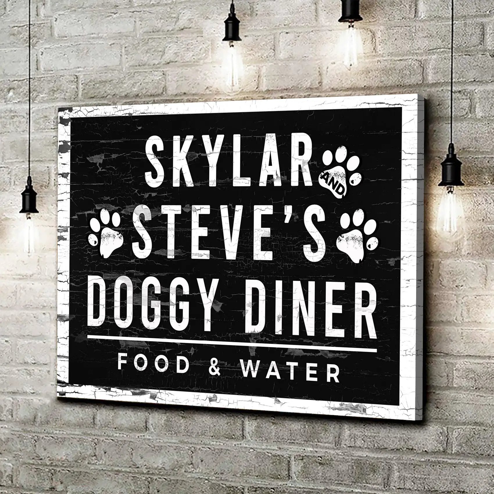 Canvas Doggy Diner sign with bold white lettering and paw prints on a distressed black panel on Tampa Home & Garden Store