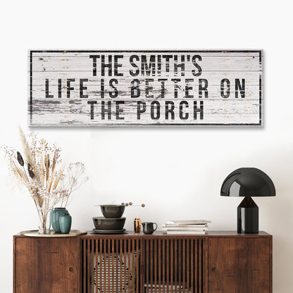 Family Name Porch Sign canvas wall art in white wood with bold black letters on porch on Tampa Home & Garden Store