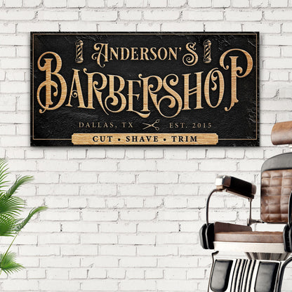 Canvas sign Barbershop by Tailored Canvases with black background and gold lettering on Tampa Home & Garden Store