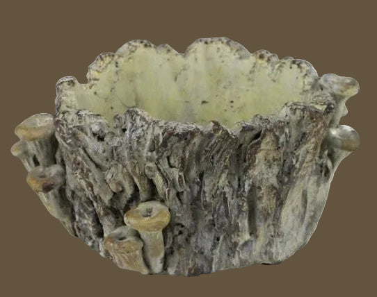 Gray cement planter shaped like a tree stump with mushroom accents Thenestedfig on Tampa Home & Garden Store
