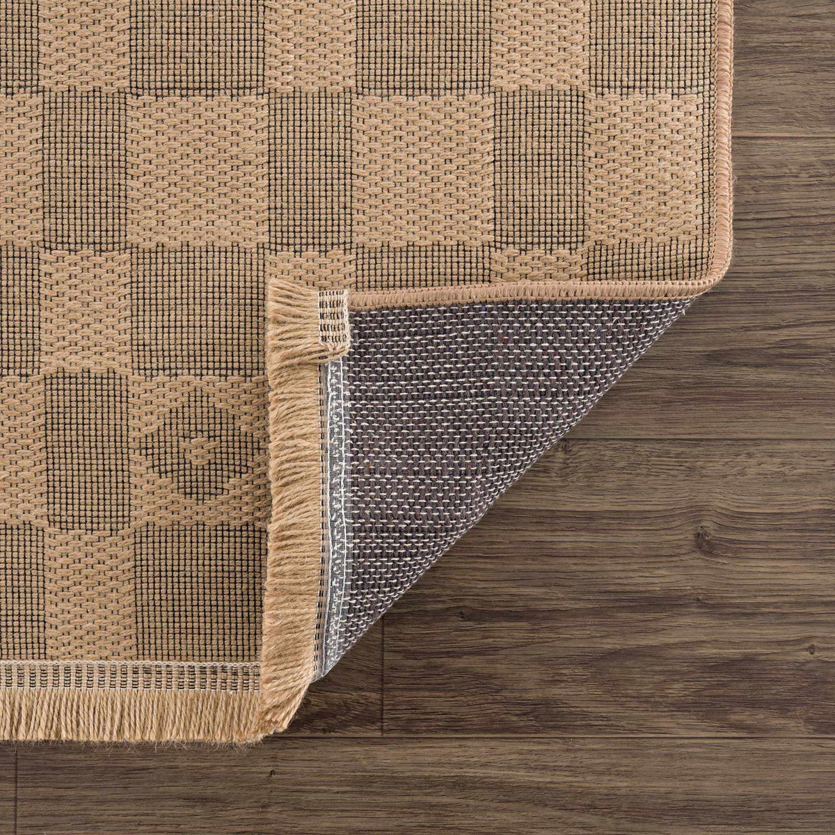 Nairi Checkered Washable Jute Rug, tan and black pattern with fringed edges Boutique Rugs on Tampa Home & Garden Store