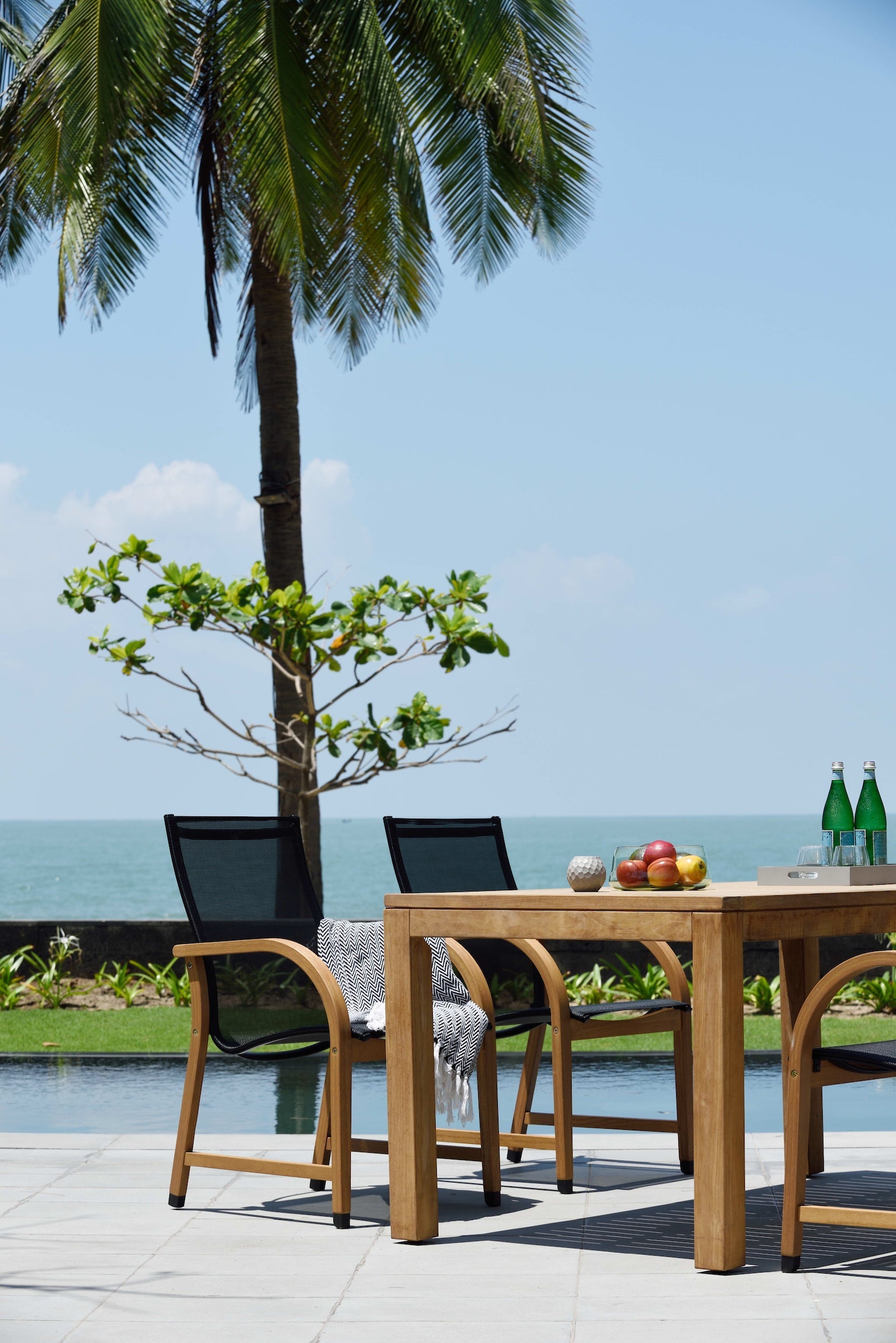 Rinjani Rectangular Table with 8 Manhattan Black Armchairs outdoor dining set on Tampa Home & Garden Store