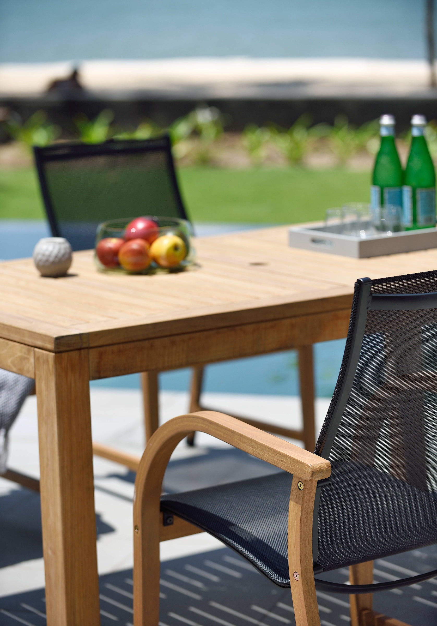 Rinjani Rectangular Big Table with 8 Manhattan Black Armchairs wood and mesh outdoor dining set on Tampa Home & Garden Store