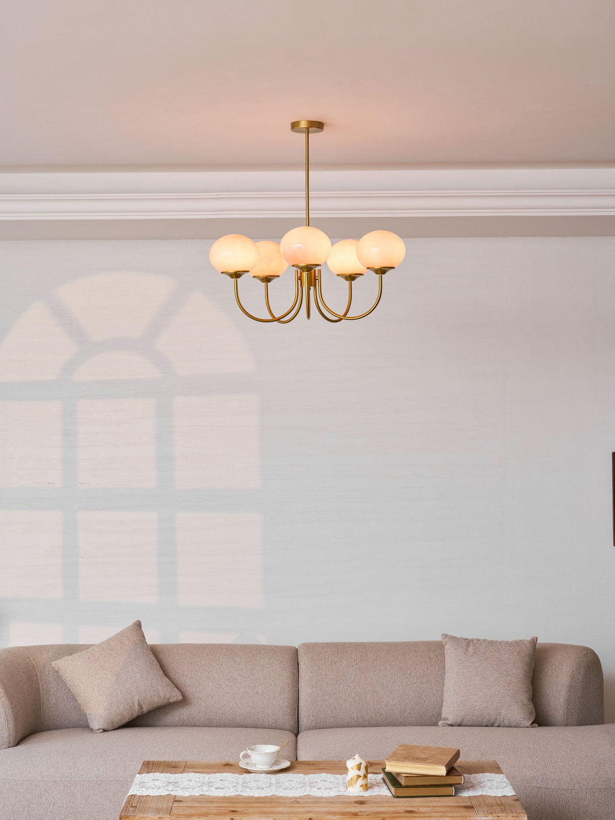 Chandelier Moktan Sabai Marshmallow with pink hand-sprayed glass bubble shades and brass arms on Tampa Home & Garden Store