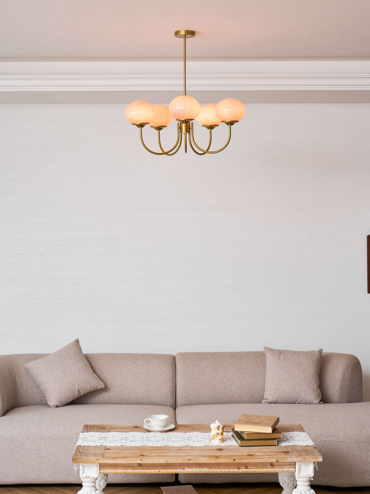 Chandelier Marshmallow by Moktan Sabai; brass frame with 6 hand-sprayed pink glass bubble shades on Tampa Home & Garden Store