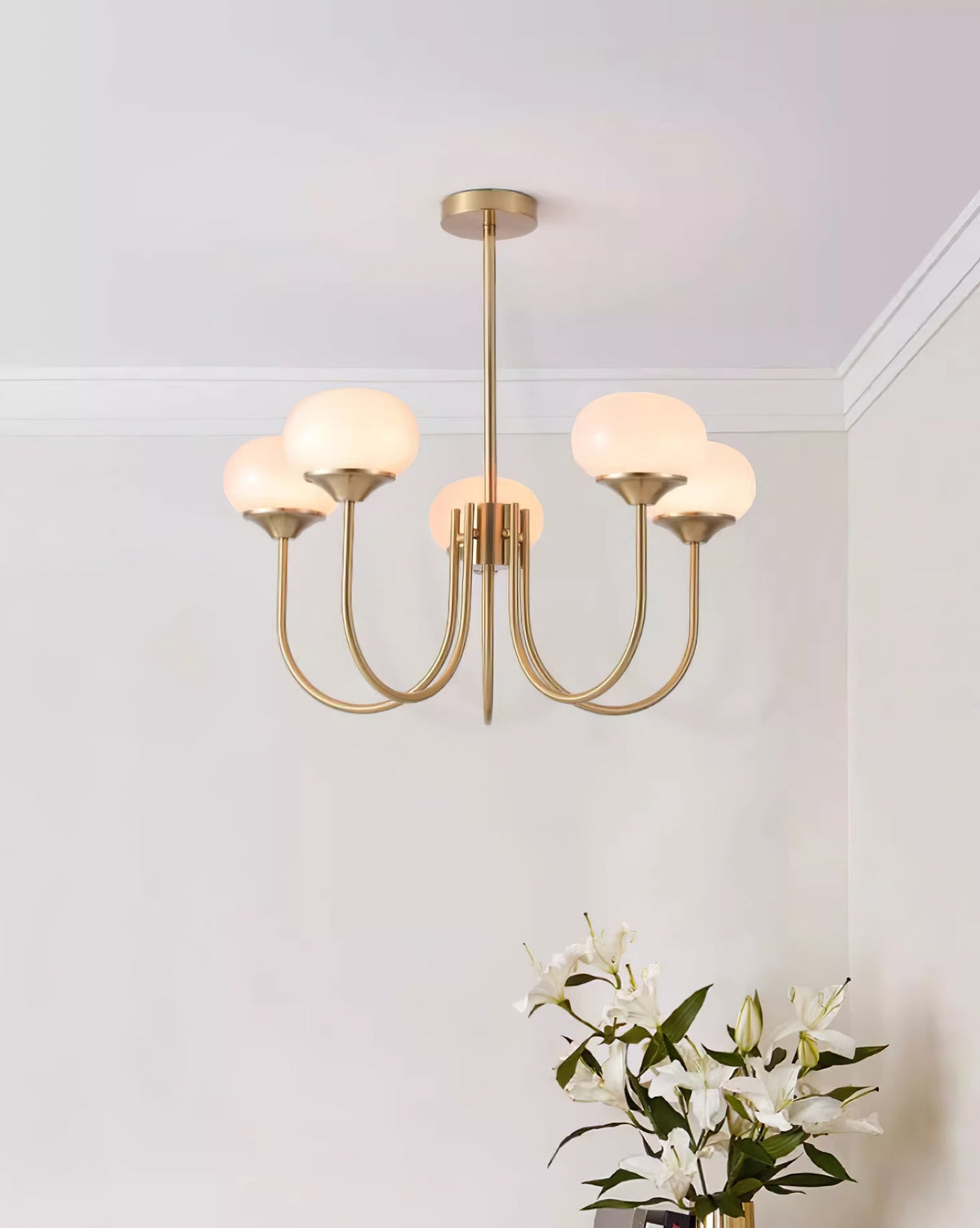 Marshmallow bubble chandelier with hand-sprayed pink shades by Moktan Sabai, brass arms on Tampa Home & Garden Store