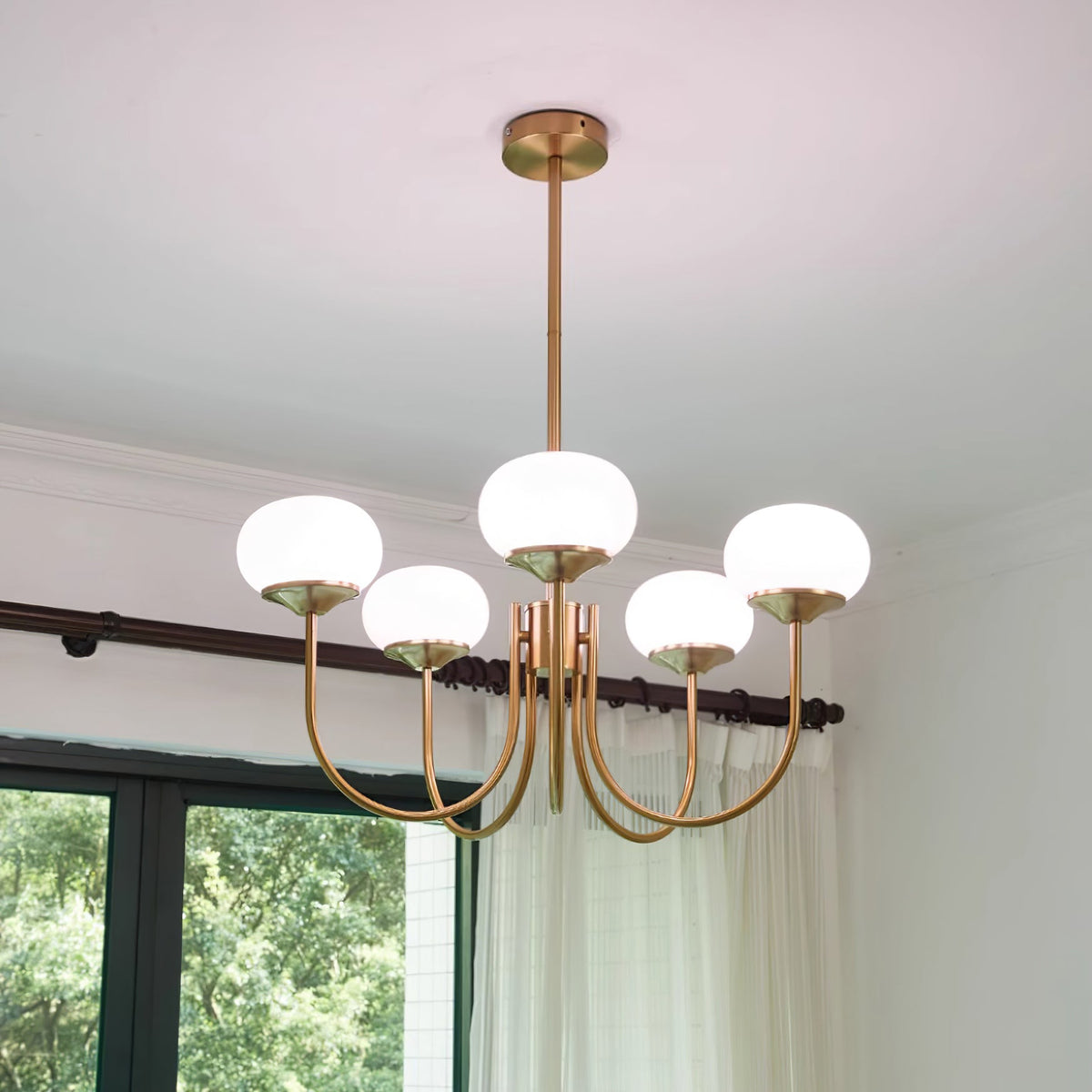 Marshmallow modern glass bubble chandelier in brass with white globe shades by Moktan Sabai on Tampa Home & Garden Store