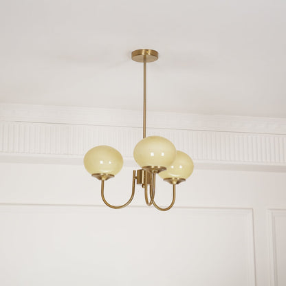 Marshmallow chandelier by Moktan Sabai; five pink-tinted glass bubbles in brass frame on Tampa Home & Garden Store