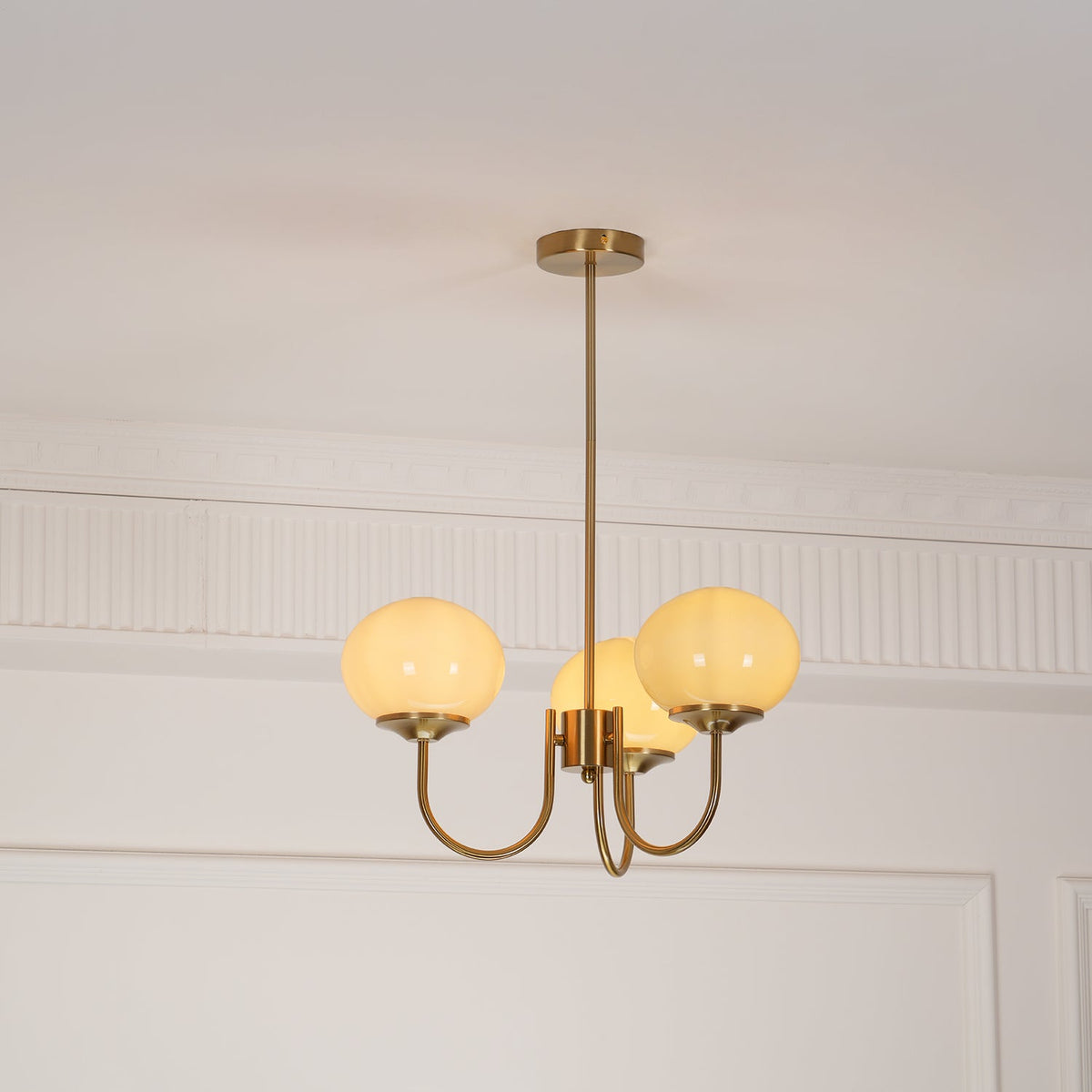 Marshmallow chandelier with frosted glass bubble globes, brass gold finish by Moktan Sabai on Tampa Home & Garden Store