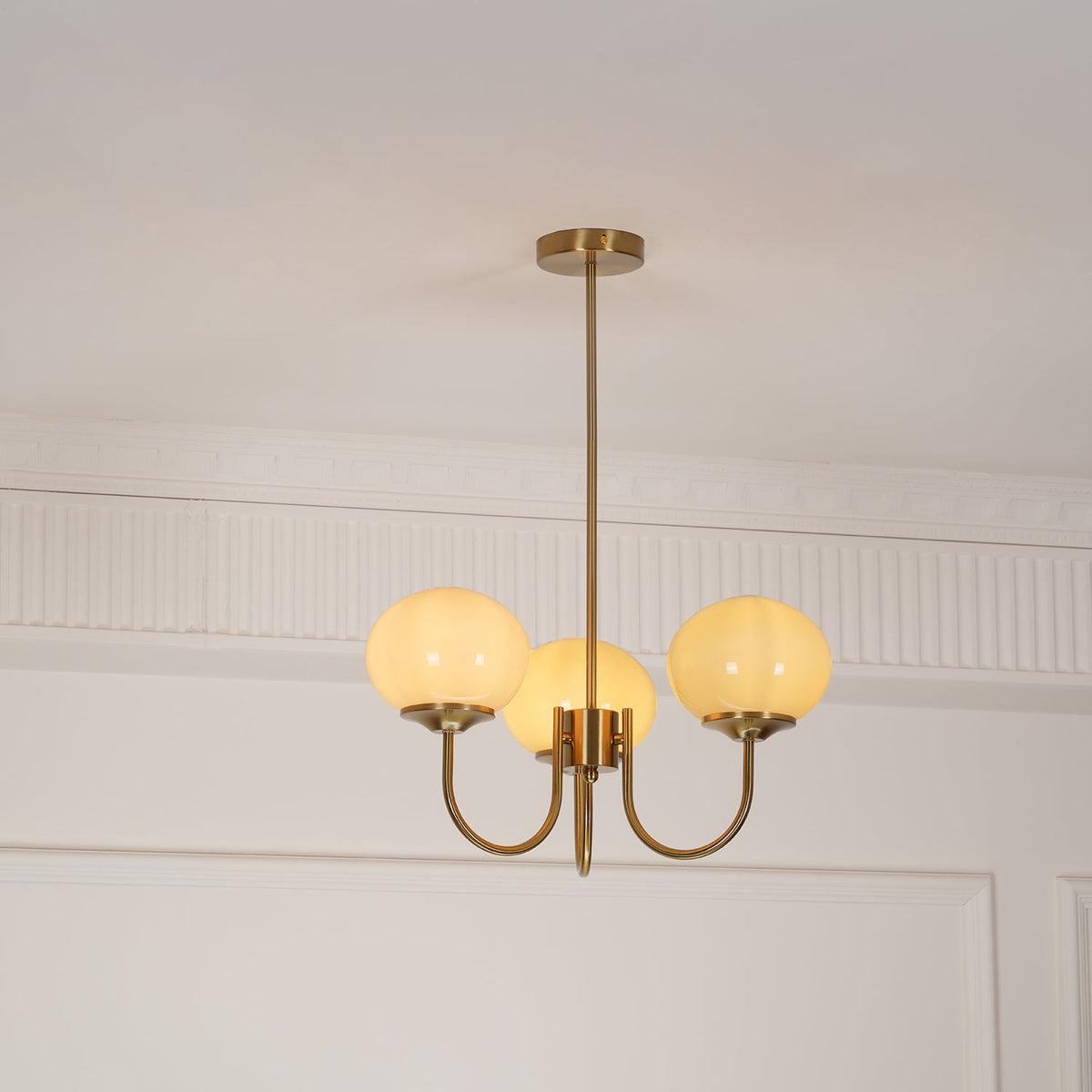 Marshmallow chandelier Moktan Sabai with pink glass bubble shades brass finish on Tampa Home & Garden Store