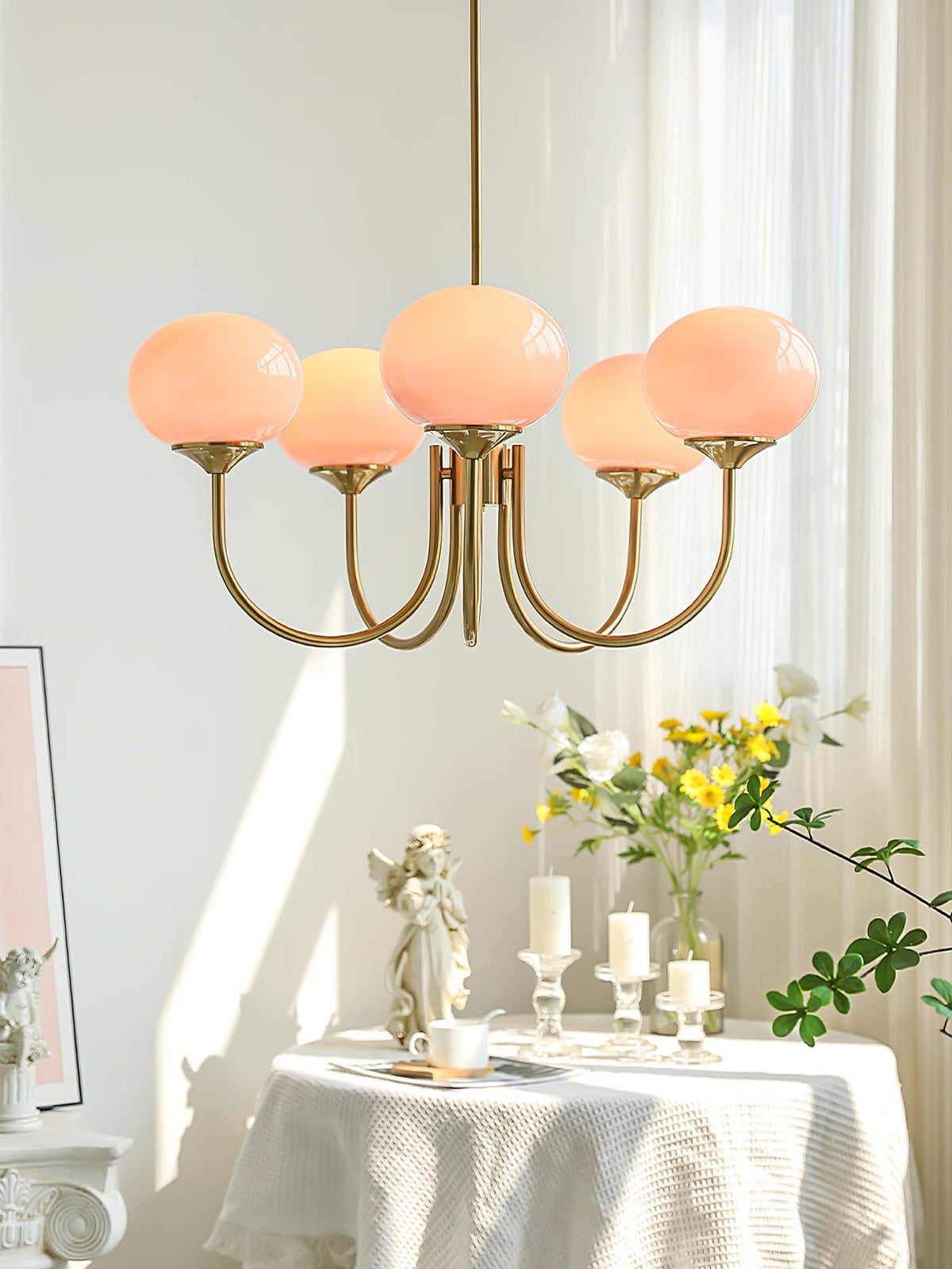 Chandelier Marshmallow by Moktan Sabai with pink glass globe shades and brass arms on Tampa Home & Garden Store