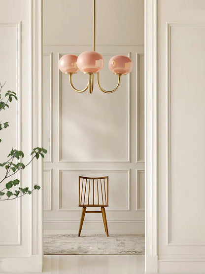 Chandelier Moktan Sabai Marshmallow three pink hand-sprayed glass globes on gold brass arms on Tampa Home & Garden Store