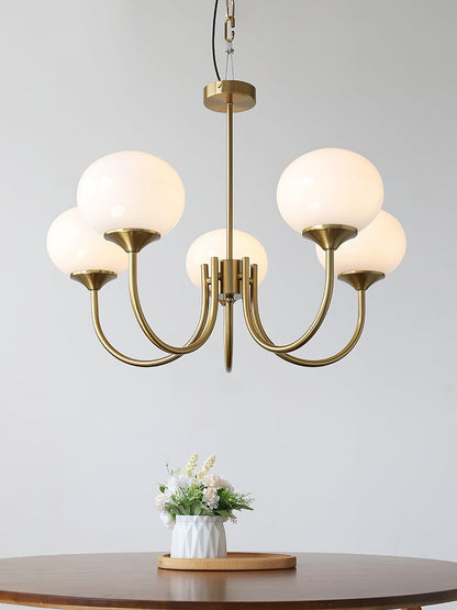 Chandelier Moktan Sabai modern glass bubble with brass arms and white globe shades on Tampa Home & Garden Store