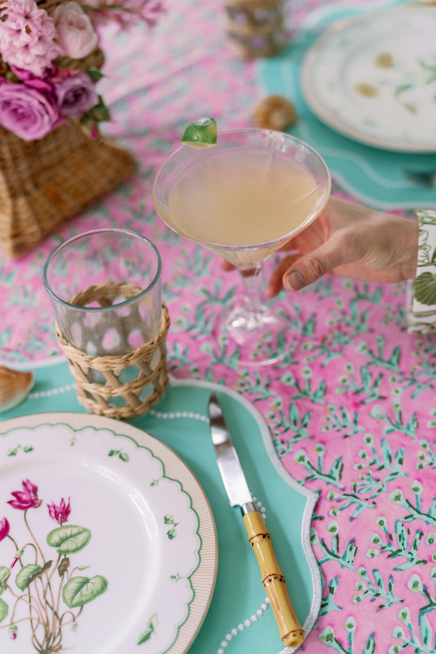 Tulip Pink Sydney Tablecloth by Erin Donahue Tice, pink floral print on turquoise table on Tampa Home & Garden Store