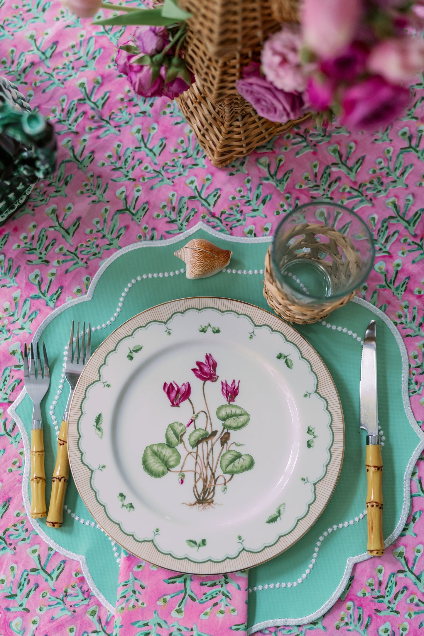 Tulip Pink Sydney Tablecloth with green stems and pink florals on pink background on Tampa Home & Garden Store