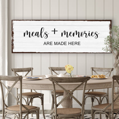 Canvas sign Meals And Memories Are Made Here with whitewashed boards and brown frame on Tampa Home & Garden Store