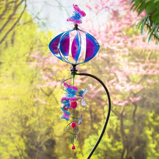 Butterfly metal wind spinner garden stake with blue and magenta wings and butterfly ornaments on Tampa Home & Garden Store