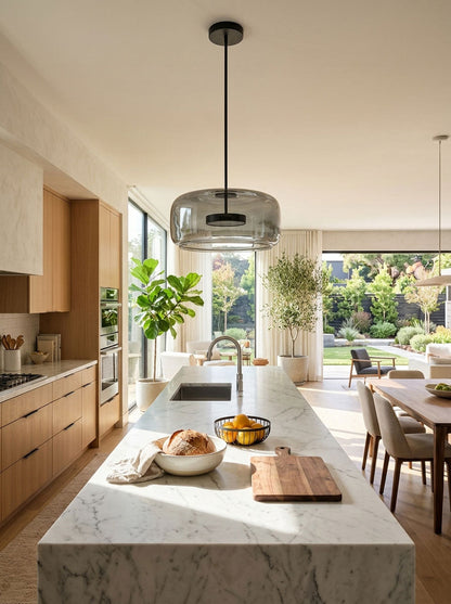 Glass Sphere Pendant Light with Warm LED, smoke-grey glass over marble island by Moktan Sabai on Tampa Home & Garden Store