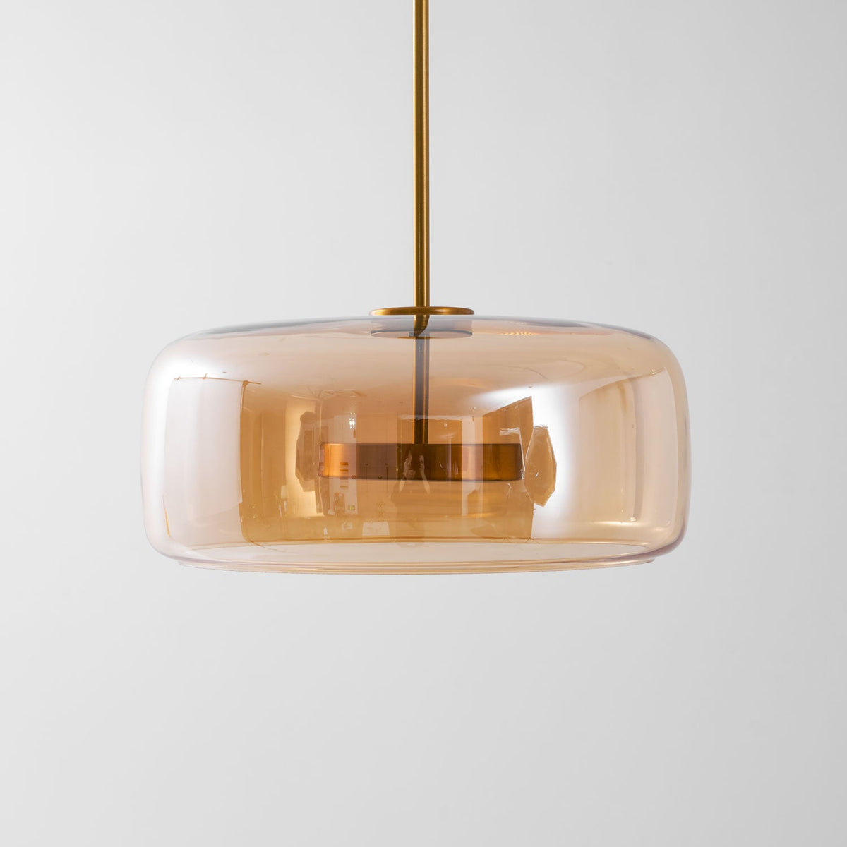 Hand-blown glass sphere pendant light with warm LED amber shade and gold stem Moktan Sabai on Tampa Home & Garden Store