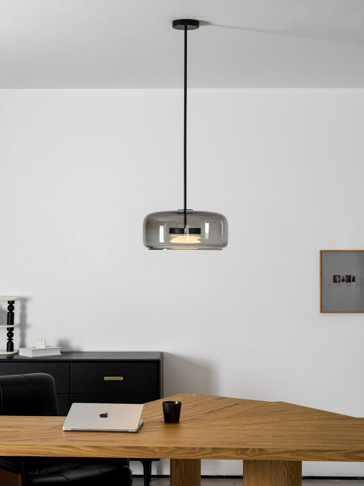Hand-blown glass sphere pendant light in smoke grey with warm LED on Tampa Home & Garden Store
