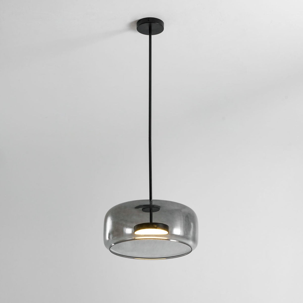 Hand-blown glass sphere pendant light by Moktan Sabai with smoke grey shade and warm LED on Tampa Home & Garden Store