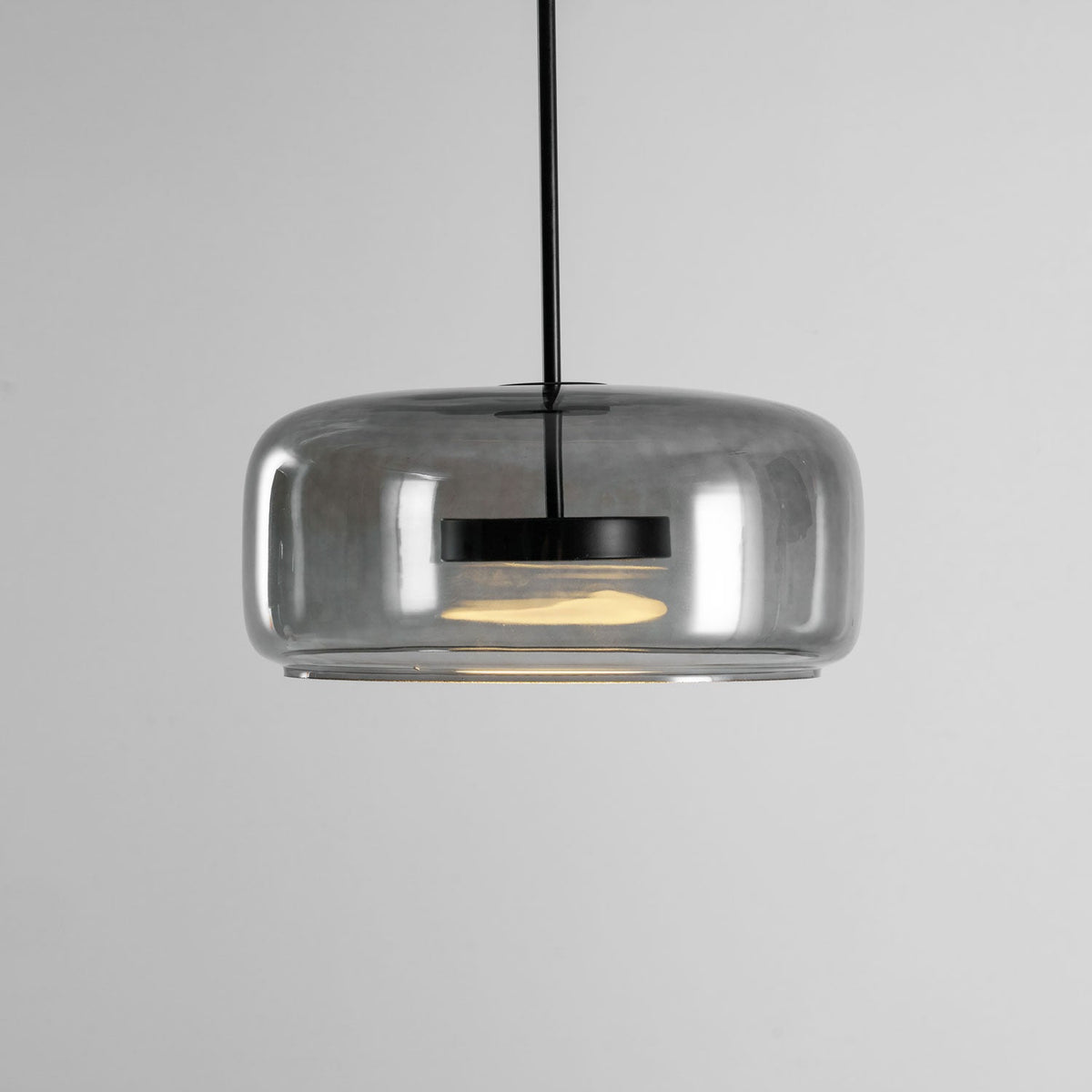 Pendant light Moktan Sabai hand blown glass sphere with smoke grey shade and warm LED on Tampa Home & Garden Store