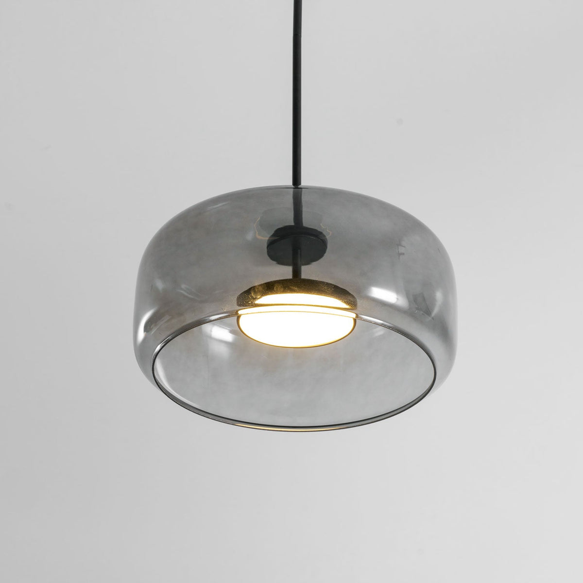 Hand-blown glass sphere pendant light Moktan Sabai with smoke-grey shade and warm LED on Tampa Home & Garden Store