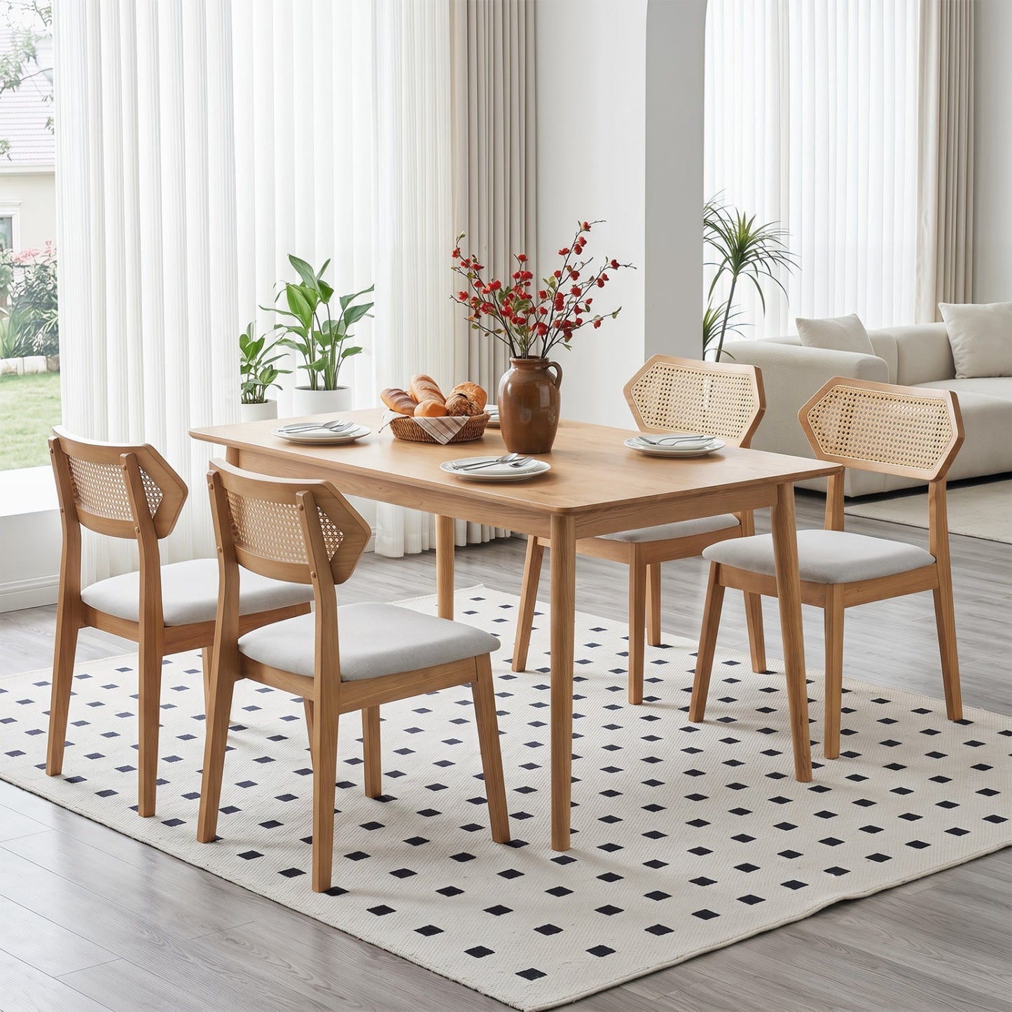 Rattan Dining Chairs Set of 4 Curved Back natural wood with cane backs around a wooden table on Tampa Home & Garden Store